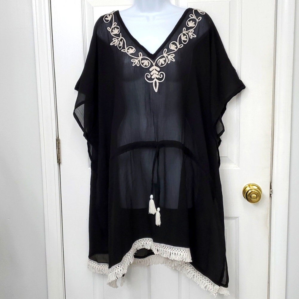 Swim cover-up NWOT black sheer one-size with dolman sleeve.  Never worn